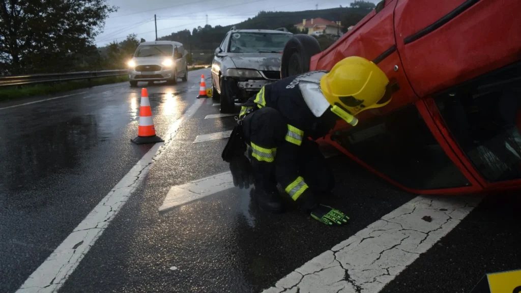 Emergency response vehicles at the scene of a car accident on a Sarasota, Florida roadway